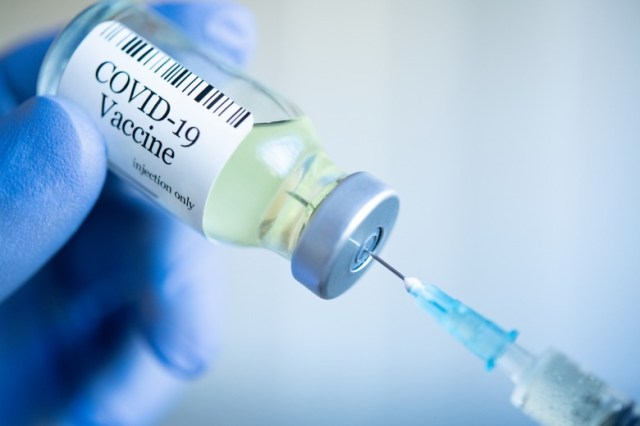 preparing-injection-with-covid19-vaccine-picture-id1230251561-1