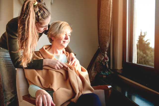 elderly-care-old-and-young-picture-id897821744